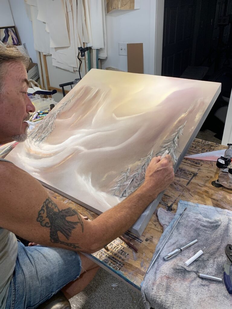 Michael Schuessler creating a piece of fine art